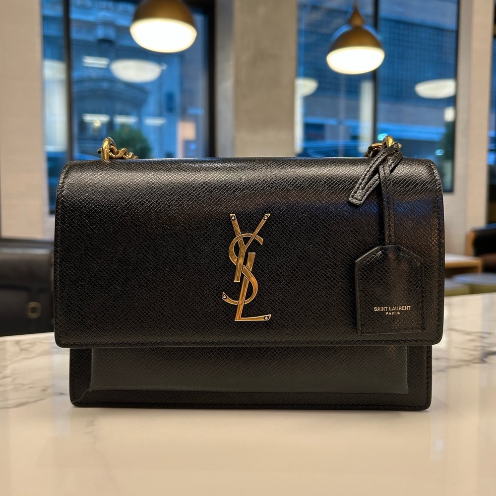 Saint Laurent Black and Gold Shoulder.